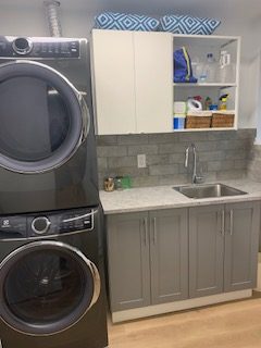 The laundry room also houses the homes efficient combi-boiler system.